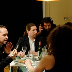 Antony Hickling right directs the dinner scene with Andr Schneider center and Manuel Blanc left on the set of One Deep Breath November 2013