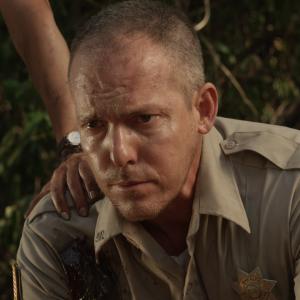Holt Boggs as Sheriff Jim Taylor in Bigfoot Wars