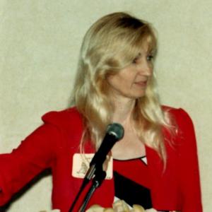 Martha speaking at a writers conference