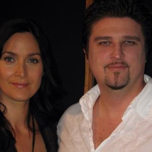 left actress CarrieAnne Moss and director Chris Borders in the studio for Mass Effect 2