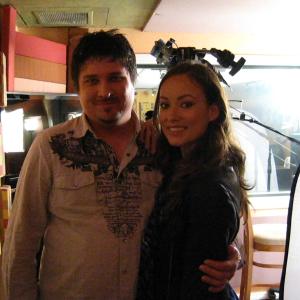 director Chris Borders left and actress Olivia Wilde right on the set of Tron Evolution