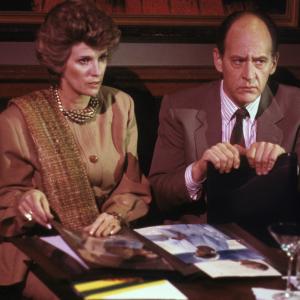Still of Earl Boen and Barbara Bosson in Hotel 1983