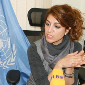 Yasmina Bouziane carrying out interview as part of the United Nations in Lebanon.