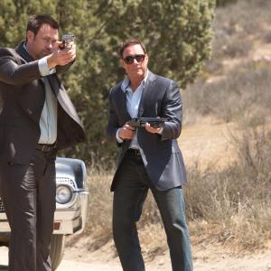 Still of Jean-Claude Van Damme and Grant Bowler in Swelter (2014)