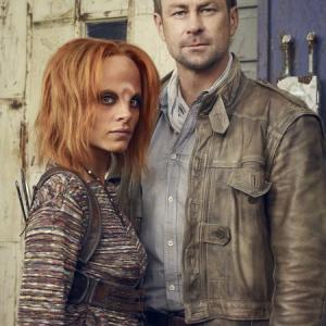 Still of Grant Bowler and Stephanie Leonidas in Defiance 2013