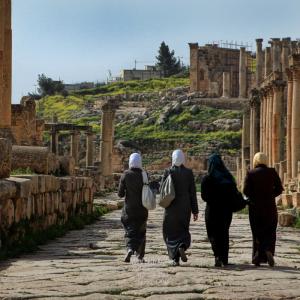 four beautiful Jordanian women walking through Jaresh Jordan.