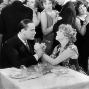 Still of Betty Balfour and Jean Bradin in Champagne 1928