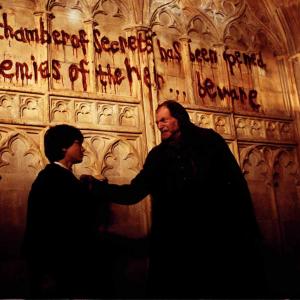 Still of David Bradley and Daniel Radcliffe in Haris Poteris ir paslapciu kambarys 2002