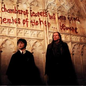 Still of David Bradley and Daniel Radcliffe in Haris Poteris ir paslapciu kambarys 2002