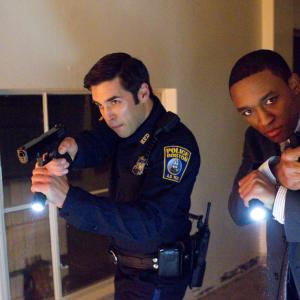 Still of Jordan Bridges and Lee Thompson Young in Rizzoli amp Isles 2010