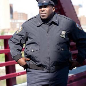 Still of movie Excuse Me For Living Officer Franklin Kevin Brown who plays Dot Com in 30 Rock He isnt all that pleased with Dan Tom Pelphrey offscreen