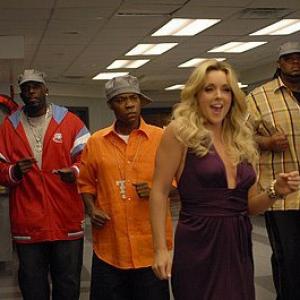 Still of 30 Rock's Ep 210 with Kevin 'Dot Com' Brown, Tracy Morgan, Jane Krakowski and Grizz Chapman dancing to the tune of Gladys Knight's hit 'Midnight Train to Georgia'.