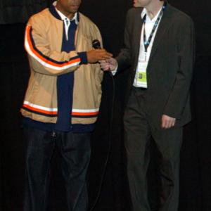 Russel Simmons and director Victor Buhler at the premiere of Rikers High