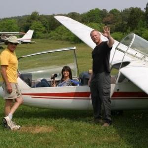 Glider pilot Randy Charlton with actor Tamara Feldman, and Director Kurt Burk on set of 