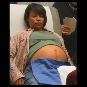 Pregnant stomach on Strong Medicine