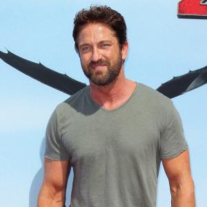 Actor Gerard Butler attends the premiere of Twentieth Century Fox and DreamWorks Animation How to Train Your Dragon 2 at the Regency Village Theatre on June 8 2014 in Westwood California