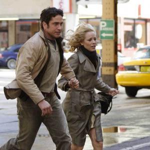 Still of Maria Bello and Gerard Butler in Butterfly on a Wheel (2007)