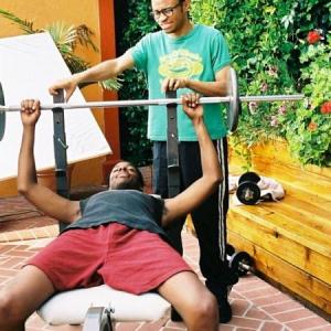 Eugene Byrd and Maurice Patton lift weights and discuss women