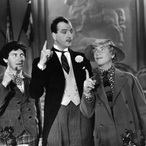 Still of Louis Calhern, Chico Marx and Harpo Marx in Duck Soup (1933)