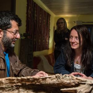 Still of Mhairi Calvey as Crystal talking with director Ilyas Kaduji on the set of Abduct 2014