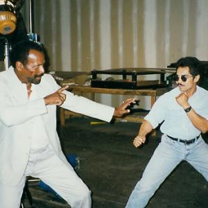 Art Camacho and Fred The Hammer Williamson on set of Whatever it takes