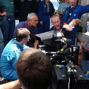 Center Row (L-R): Genya Chernaiev (MIR 1 Pilot), Victor Nischeta (MIR 2 Pilot), James Cameron (Director/Producer) - Top Row (L-R): Dr. Maya Tolstoy (Marine Seismologist - Lamont-Doherty Earth Observatory of Columbia University), Mike Cameron (ROV Creator & Pilot), Loretta Hidalgo (Space Generation Foundation President), Dr. Pamela 