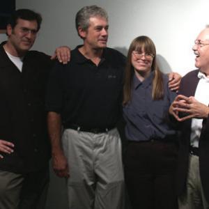 Actors Bruce Campbell and Chris Howe pose with sale rep Darlene Cypser and director Ron Teachworth during Going Back DVD Release Party September 2006
