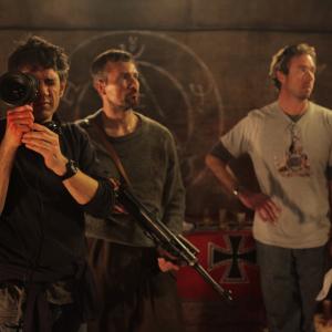 Still of Gaffer Adrian Hebron Director Paul Campion Lead Actor Craig Hall and 1st Assistant Director Richard Matthews on the set of The Devils Rock