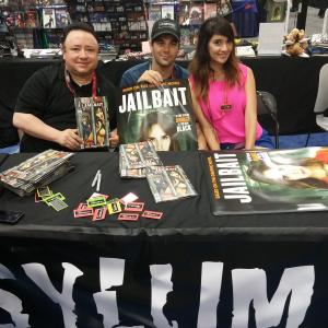 Gabriel Campisi Jared Cohn and Sara Malakul Lane at San Diego Comic Con at the Asylum booth signing for the Jailbait movie and comic book