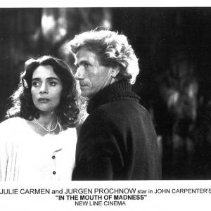 Julie Carmen and Jurgen Prochnow star in John Carpenters IN THE MOUTH OF MADNESS