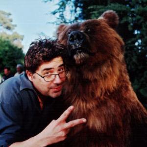 Director Steve Carr with star Archie the Bear on the set of 
