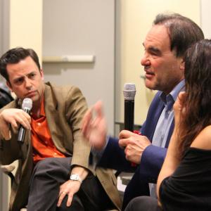 Salvador Carrasco and Oliver Stone during a QA at Santa Monica College March 22 2012
