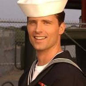 Chuck as Petty Officer Tiner on JAG