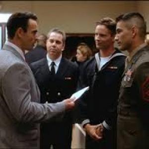 Chuck and 'JAG' castmates on set