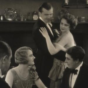Still of Madeleine Carroll and Miles Mander in The First Born 1928