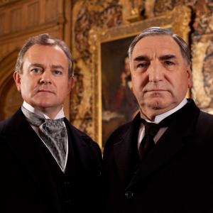 Still of Hugh Bonneville and Jim Carter in Downton Abbey (2010)