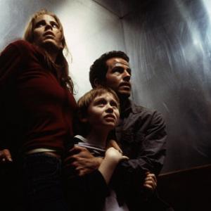 Still of Emma Caulfield, Chaney Kley and Lee Cormie in Darkness Falls (2003)
