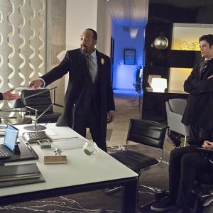 Still of Amanda Pays Tom Cavanagh Jesse L Martin and Grant Gustin in The Flash 2014