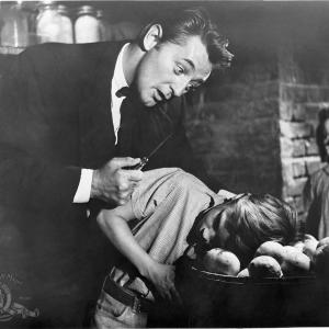 Still of Robert Mitchum Sally Jane Bruce and Billy Chapin in The Night of the Hunter 1955