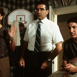 Still of Jason Biggs Molly Cheek and Eugene Levy in American Pie 1999