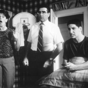 Still of Jason Biggs, Molly Cheek and Eugene Levy in American Pie (1999)