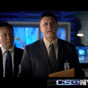 CSI NY L to R Christopher Chen as NYPD Health Services Rep Lance Irwin Carmine Giovinazzo from Season 7 Episode 19  Food for Thought