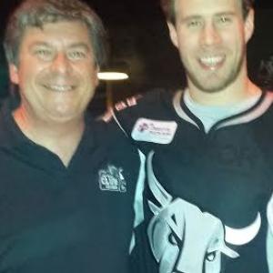 Tory Christopher with professional hockey player Corban Knight