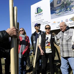 Krystee Clark and other members of Sunland-Tujunga Neighborhood Council gather for a picture at a groundbreaking ceremony for the Day Street Apartments in Sunland-Tujunga, Monday, January 14, 2013. The Day Street Apartments are a 46-unit development for homeless adults with mental illness.