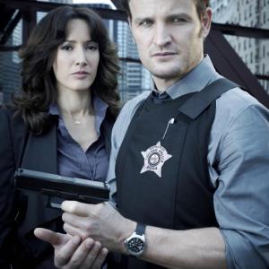 Still of Jennifer Beals and Jason Clarke in The Chicago Code 2011