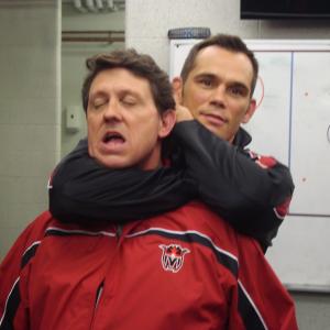 Roger getting a lesson from UFC ChampActor Rich Franklin on how to apply a sleeper hold during some downtime on the filming of The Genesis Code