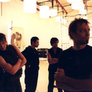 LR Robin Finck Danny Lohner Trent Reznor Charlie Clouser on the set of NINs Into the Void video shoot London late 1990s