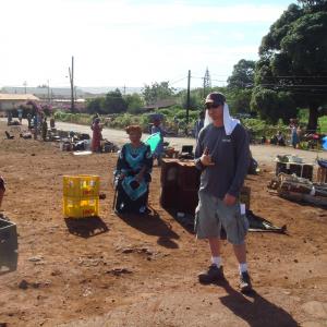 LOST Season 3 Art Director Scott Cobb on the set for Episode 5 The Cost of Living Setting up a location as a Nigerian Village on Oahu 2006