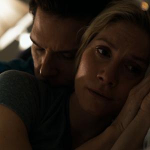 Still of Dane Cook and Elizabeth Mitchell in Answers to Nothing 2011