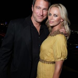 Charlize Theron and John Corbett at event of The Burning Plain 2008